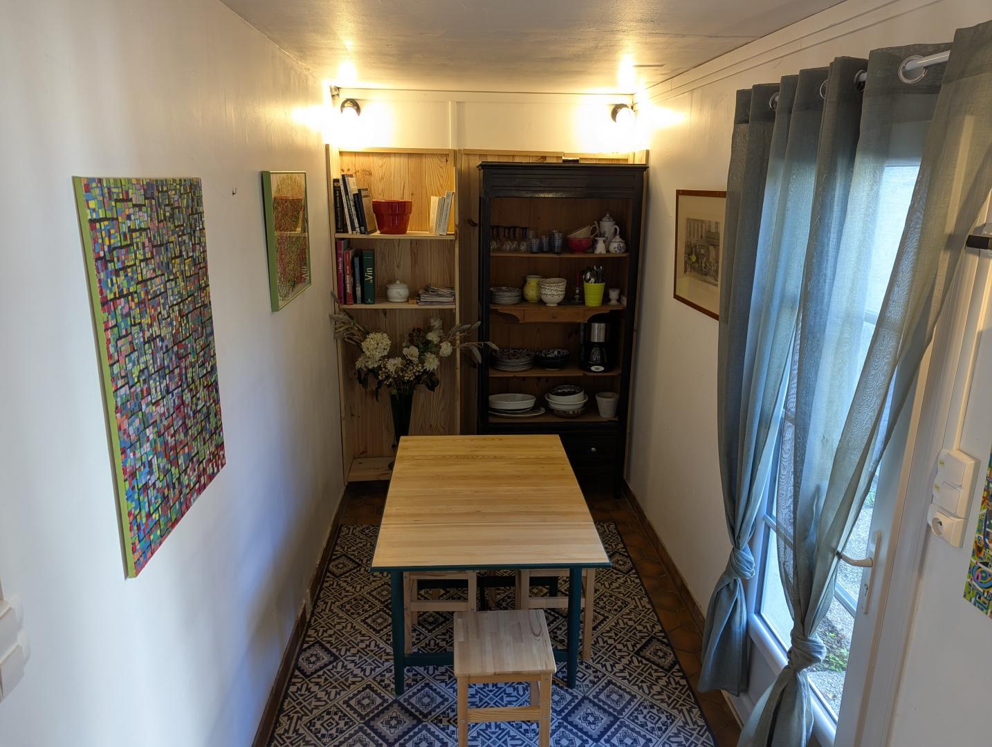 Appartement "Côté jardin" : entrée avec espace repas photo 22