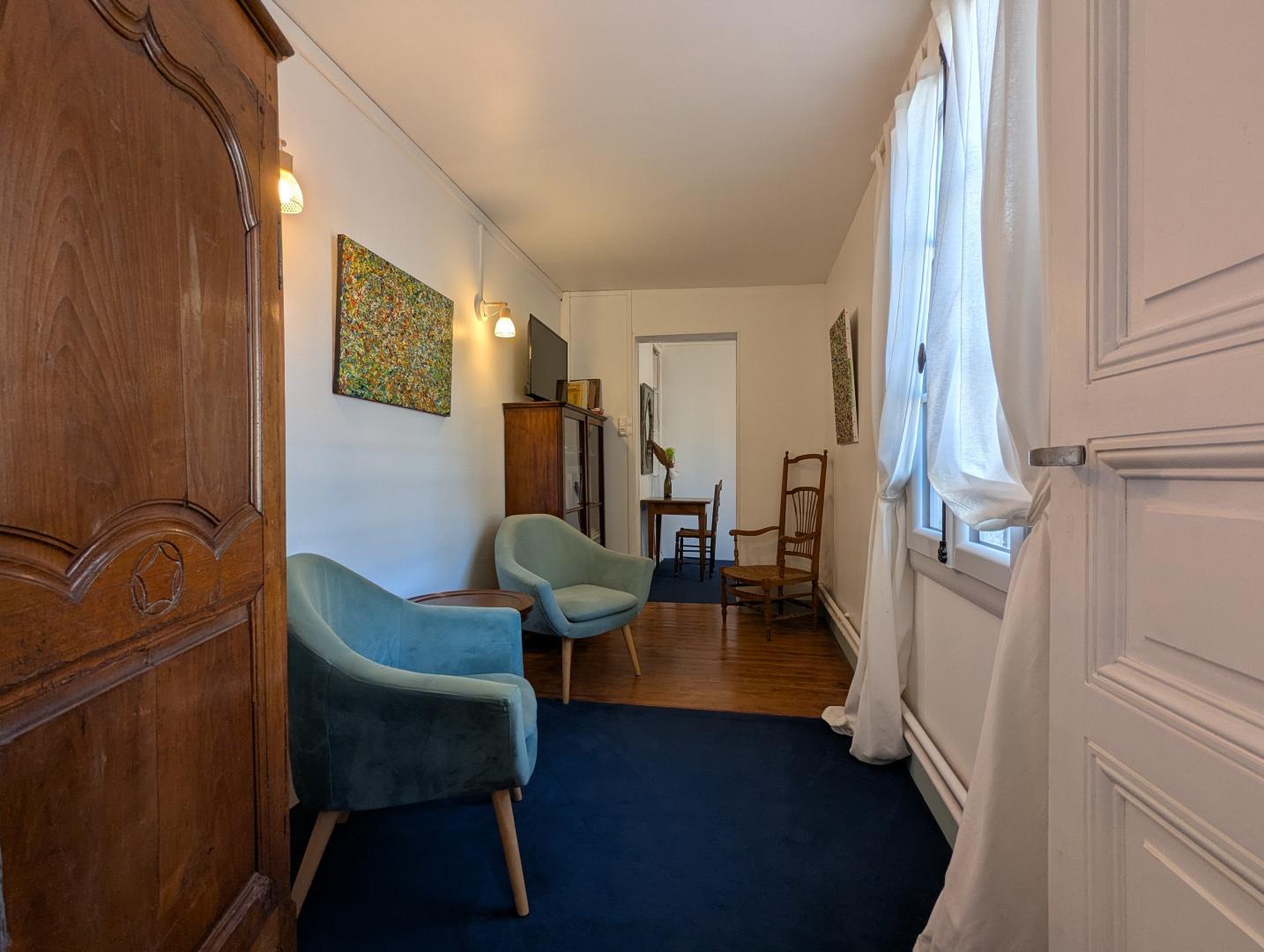 Appartement "Côté jardin" : coin salon photo 30