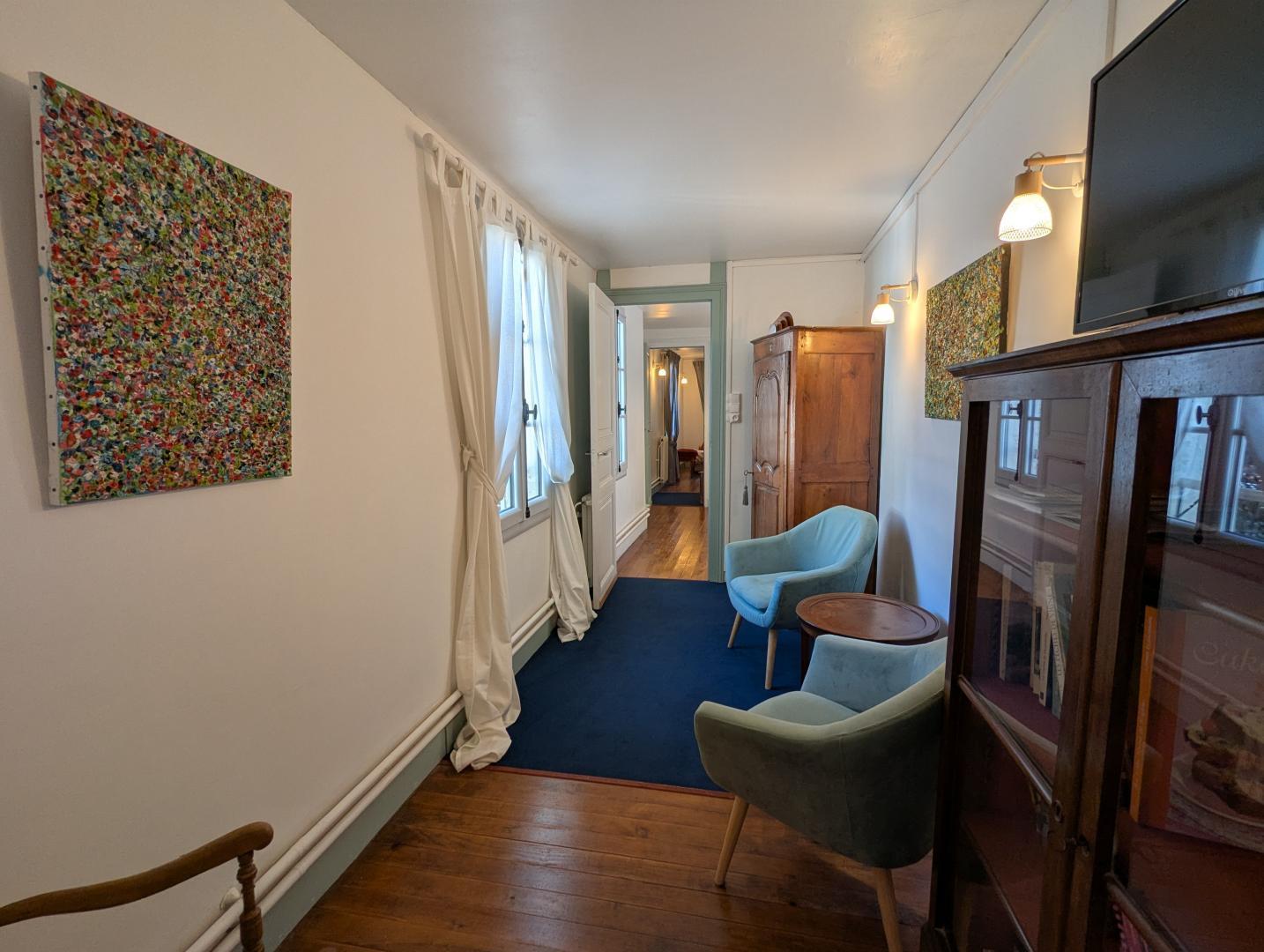 Appartement "Côté jardin" : coin salon photo 35